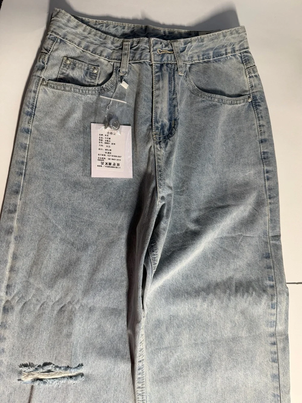 Women’s Light Wash High-Waisted Wide Leg Distressed Jeans